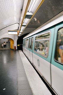 people walking down the stairs on subway