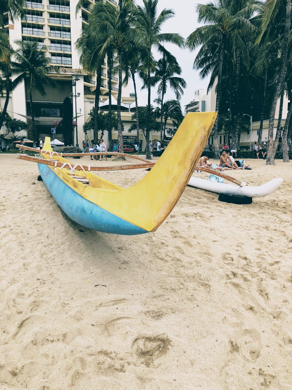 yellow and teal canoe