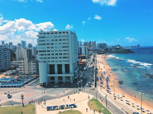 People on shore beside building during daytime — Salvador, Brazil