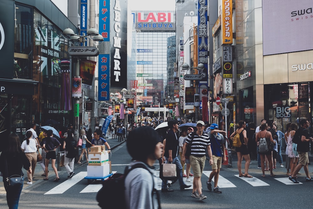 people standing on street during daytime close-up photography