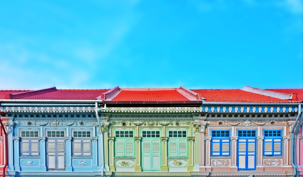 red and multicolored houses close-up photography