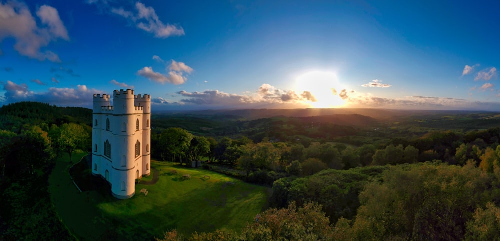 white concrete castle at golden hour