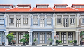 white and gray concrete buildings at daytime