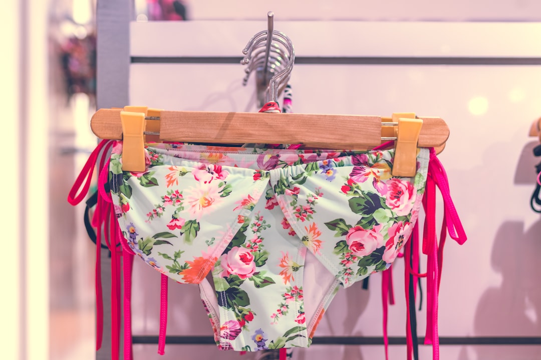 white and multicolored floral bikini close-up photography