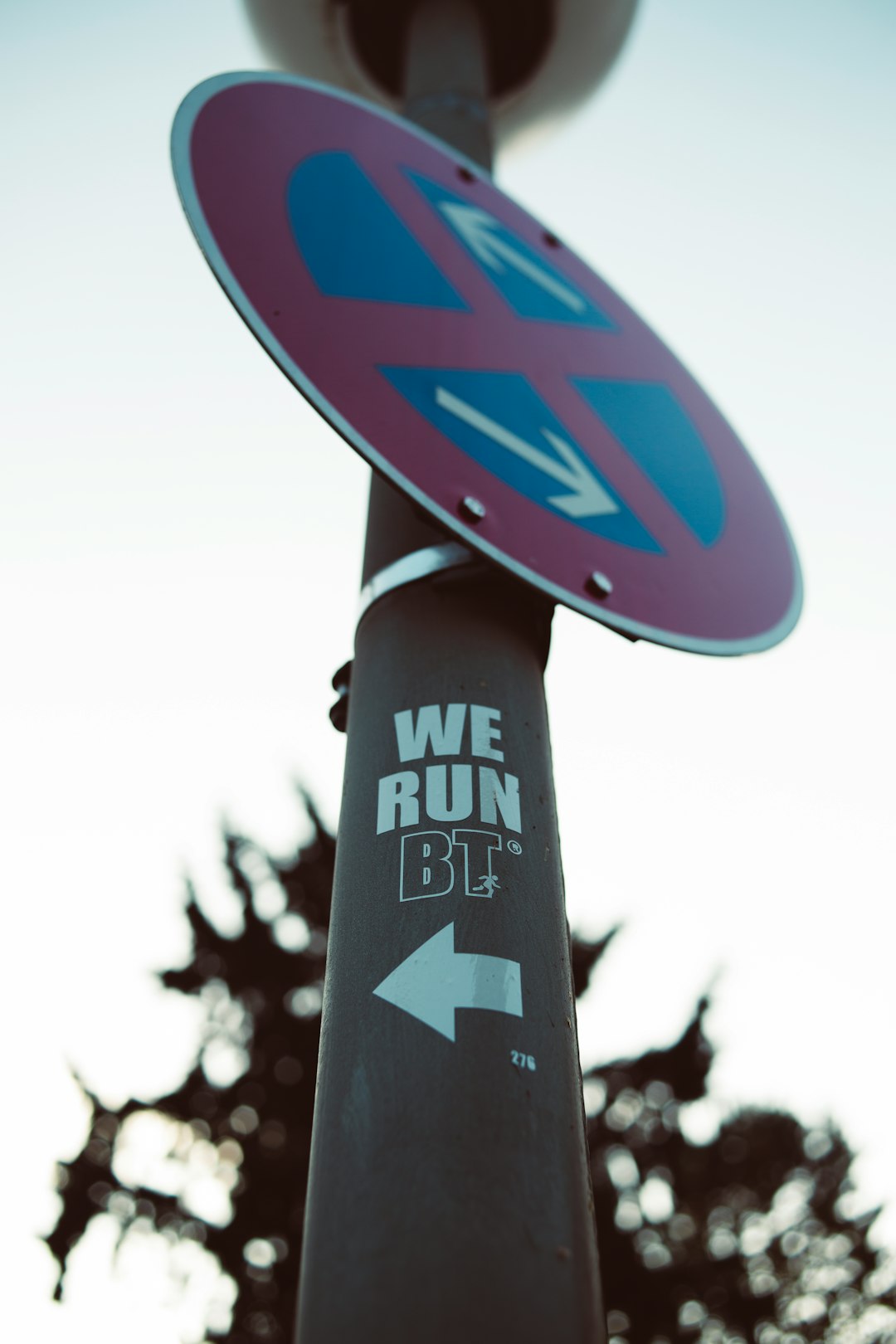 round red and blue signboard close-up photography