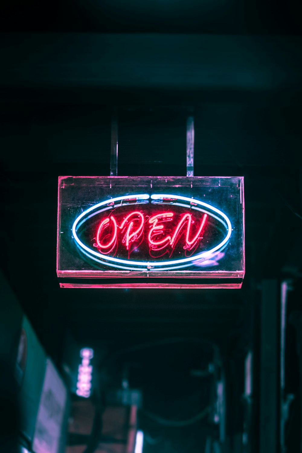 red open neon signage