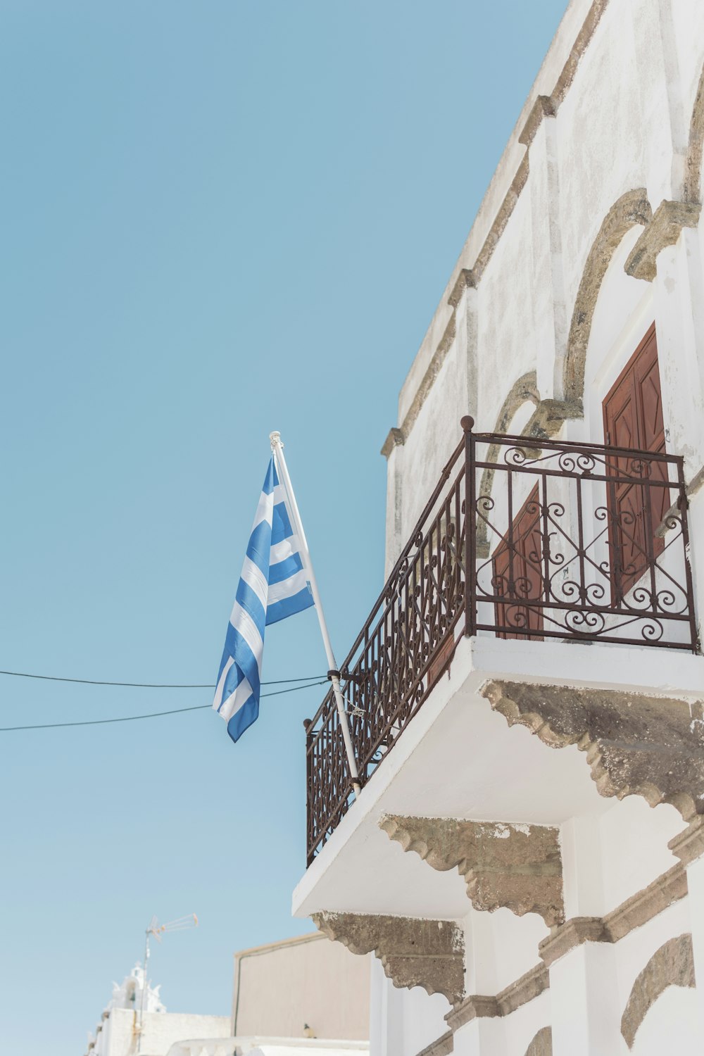 blue and white waving flags