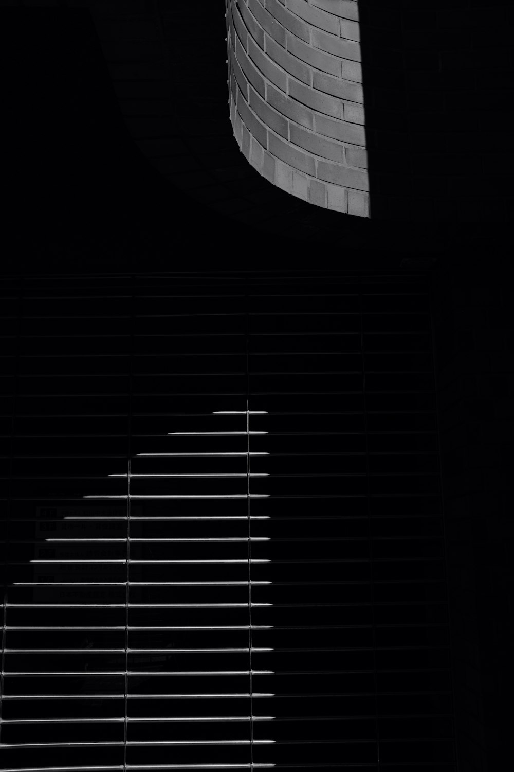 a black and white photo of a clock tower