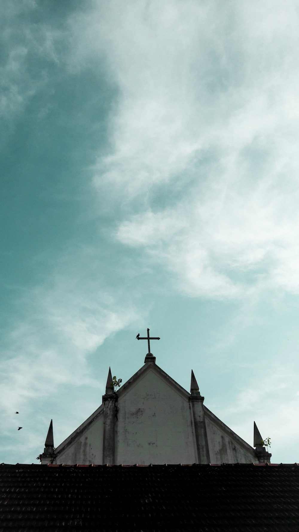 low angle photography of white concrete church