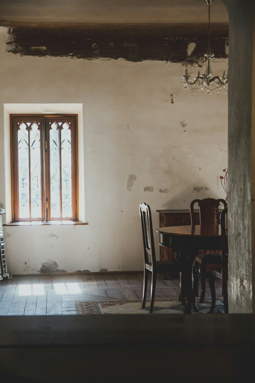 round brown wooden table and chairs