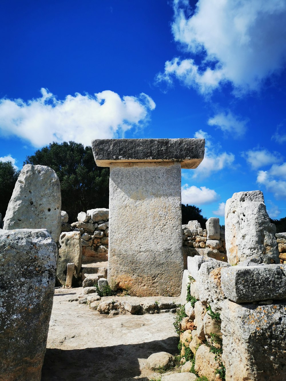concrete ancient ruins under blue sky