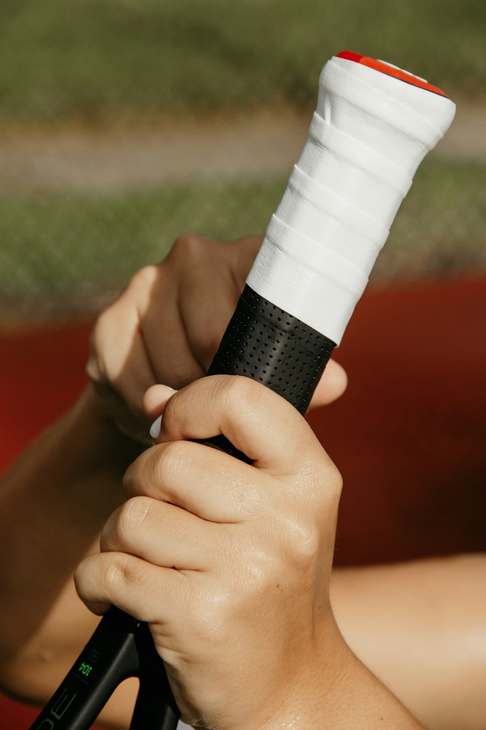 person holding tennis racket