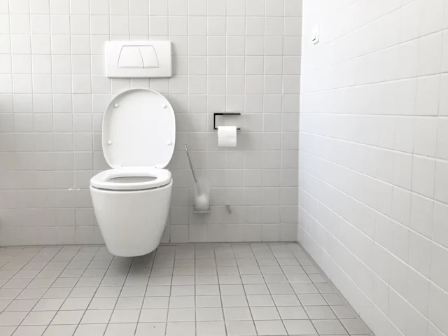Tiled WC Cubicle — commercial washroom interior design