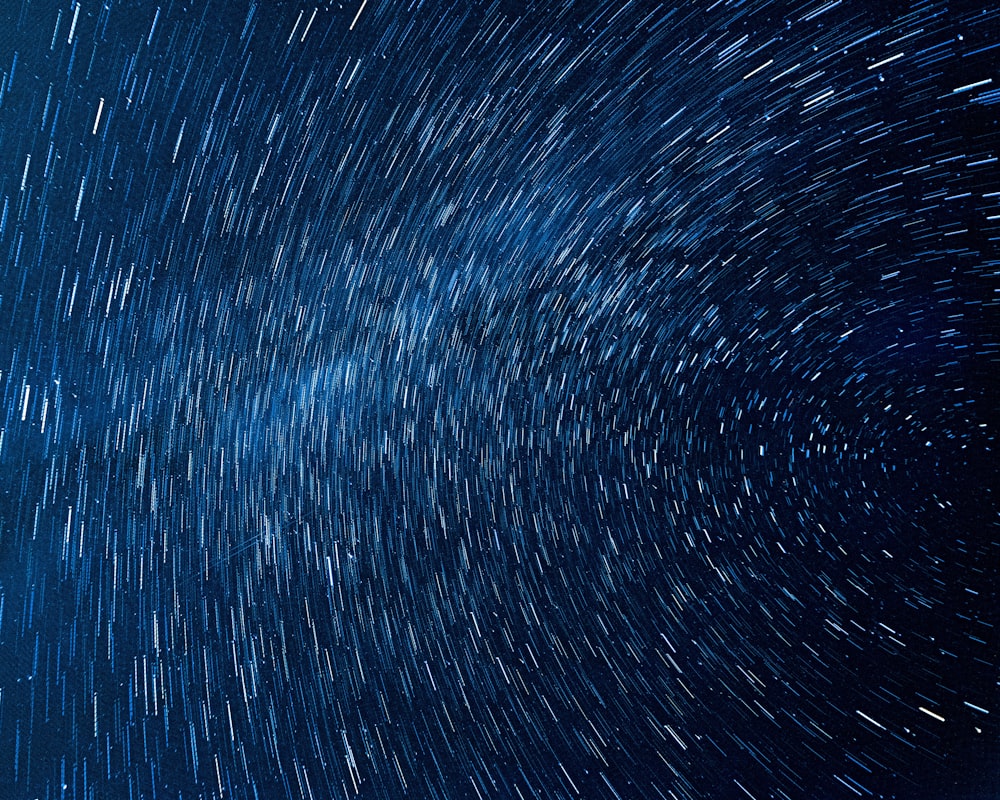 a star trail is shown in the night sky