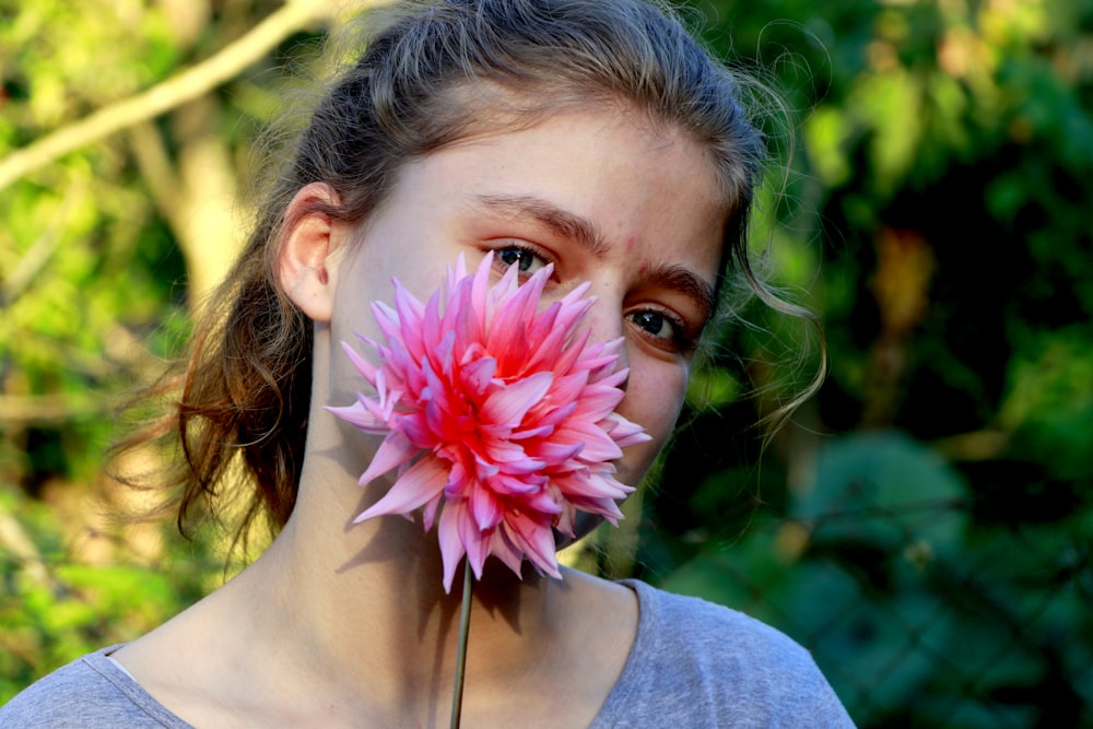 woman holding flower