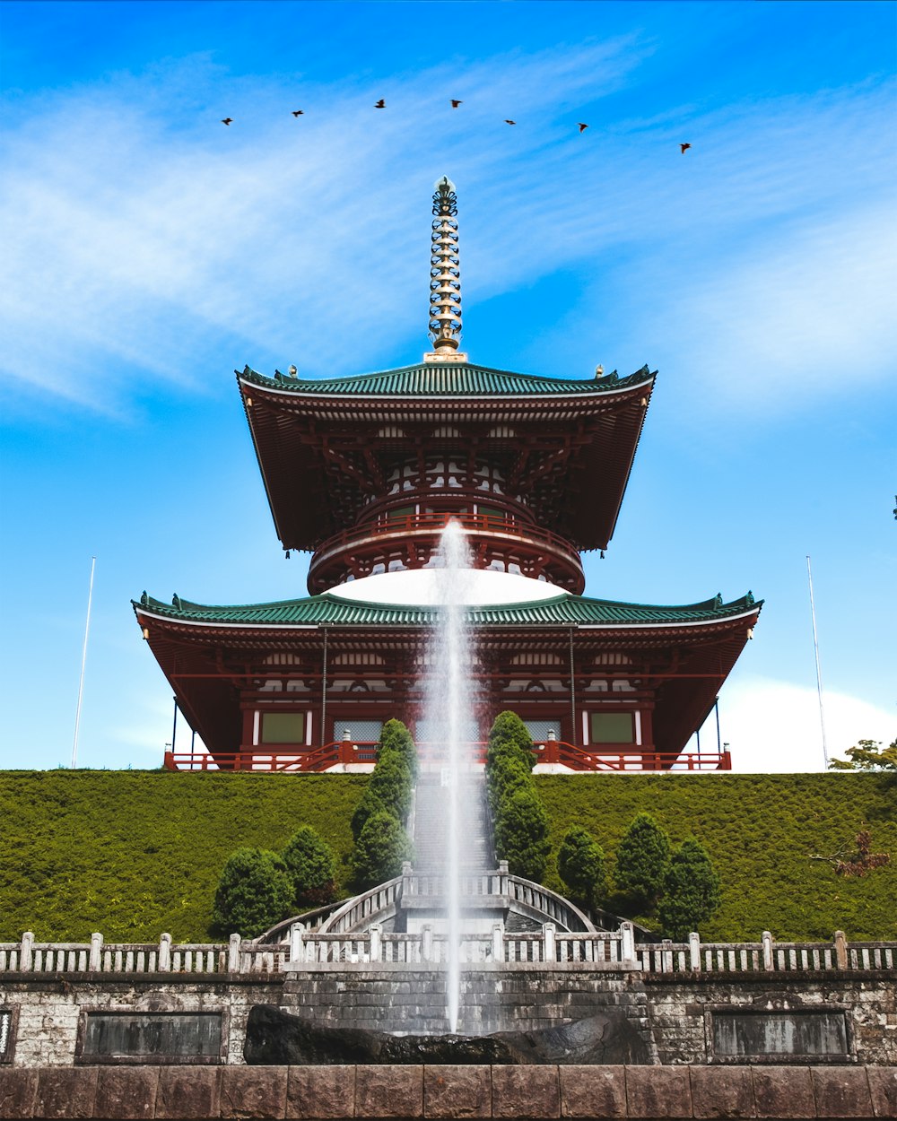 pagoda behind water fountain