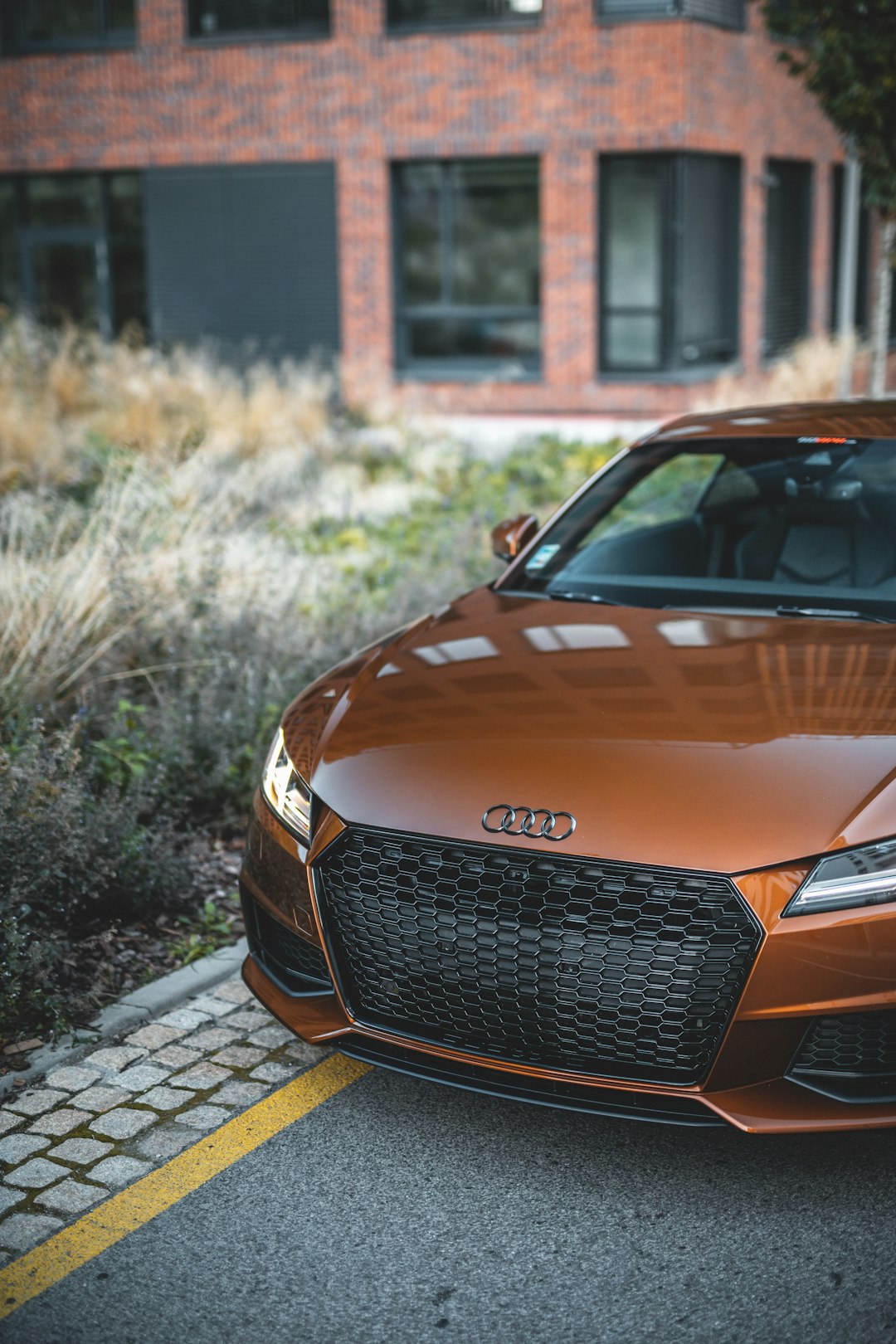 parked brown Audi car