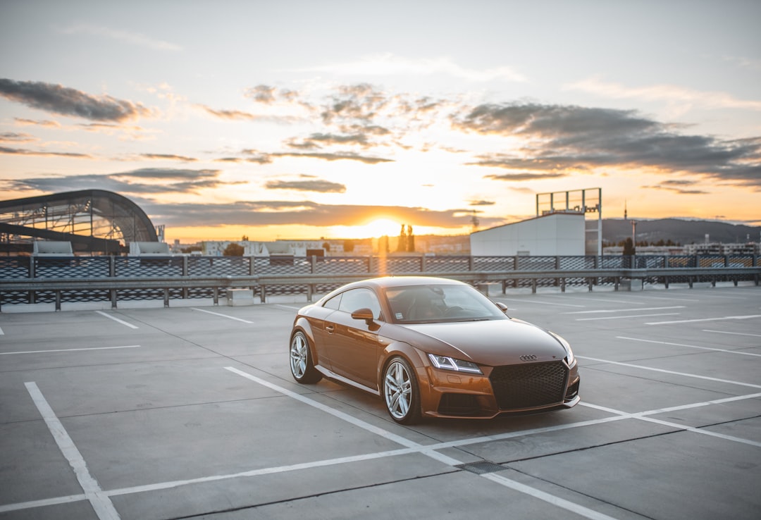 parked orange coupe