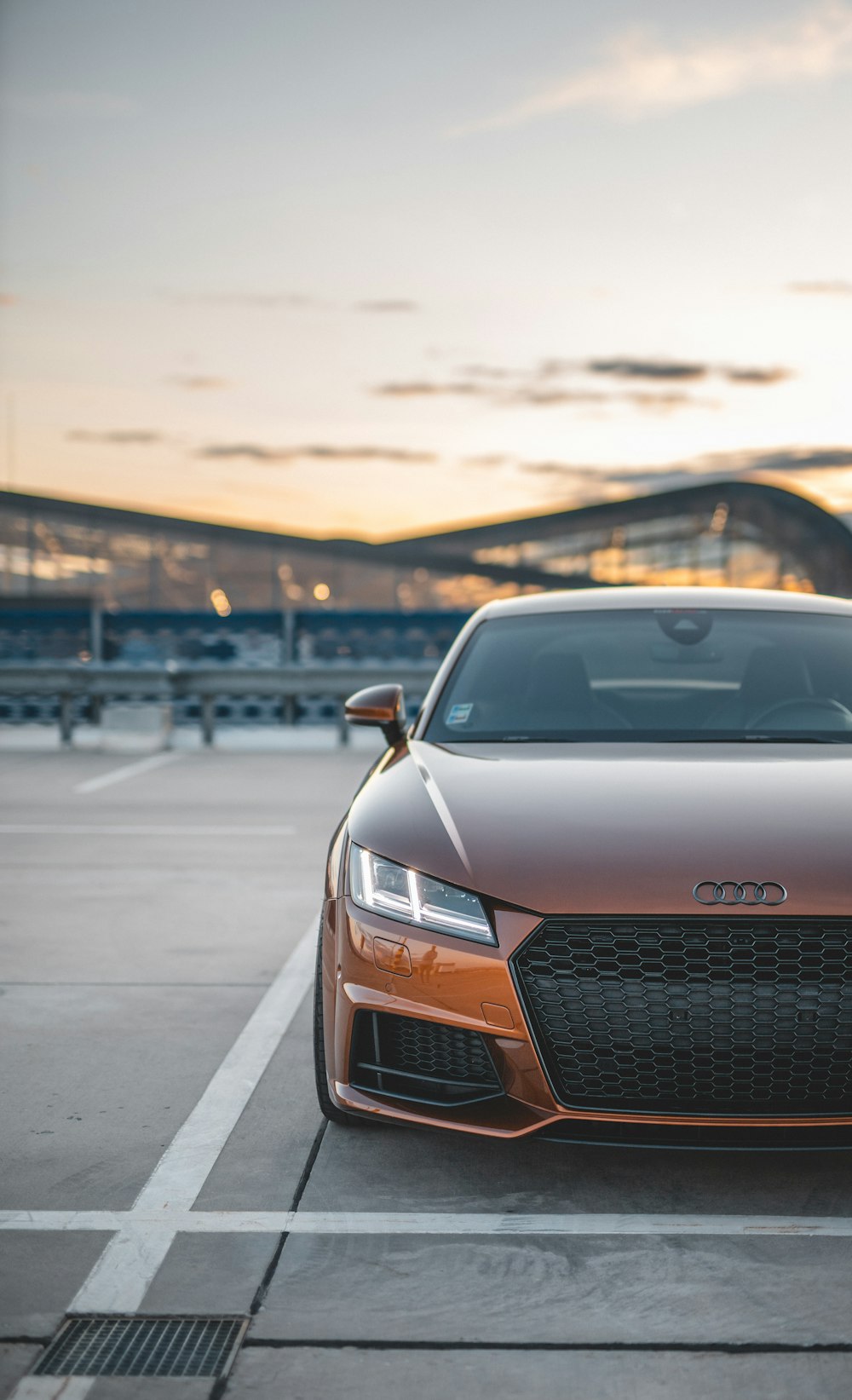 orange Audi vehicle