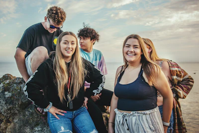 woman wears black tank top