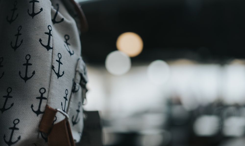 a close up of a backpack with anchors on it