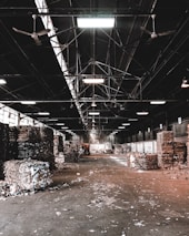 A lively warehouse filled with sorting machines and eco-friendly recycling bins.