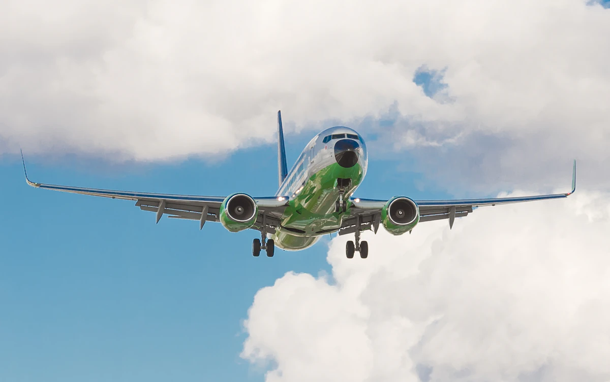 A Boeing 737 narrowbody airliner parked on an airport apron