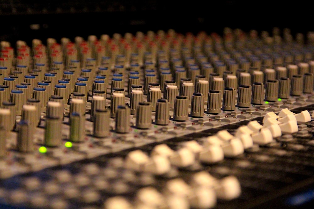 selective focus photo of audio mixer