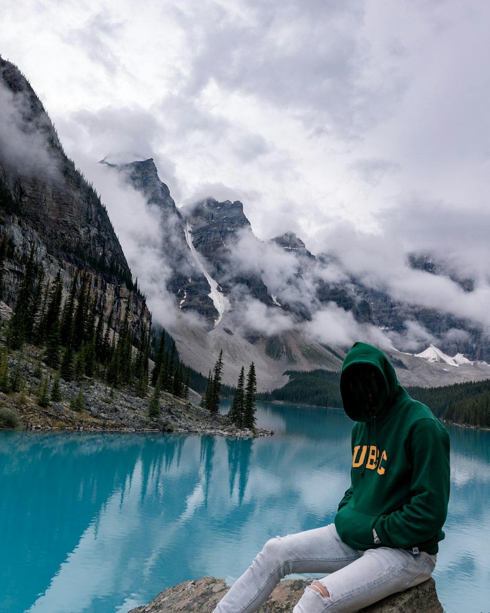 man wears black pullover hoodie