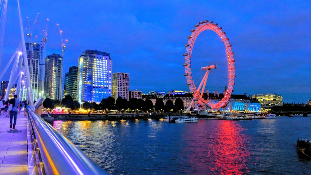 red Ferris wheel during nighttime