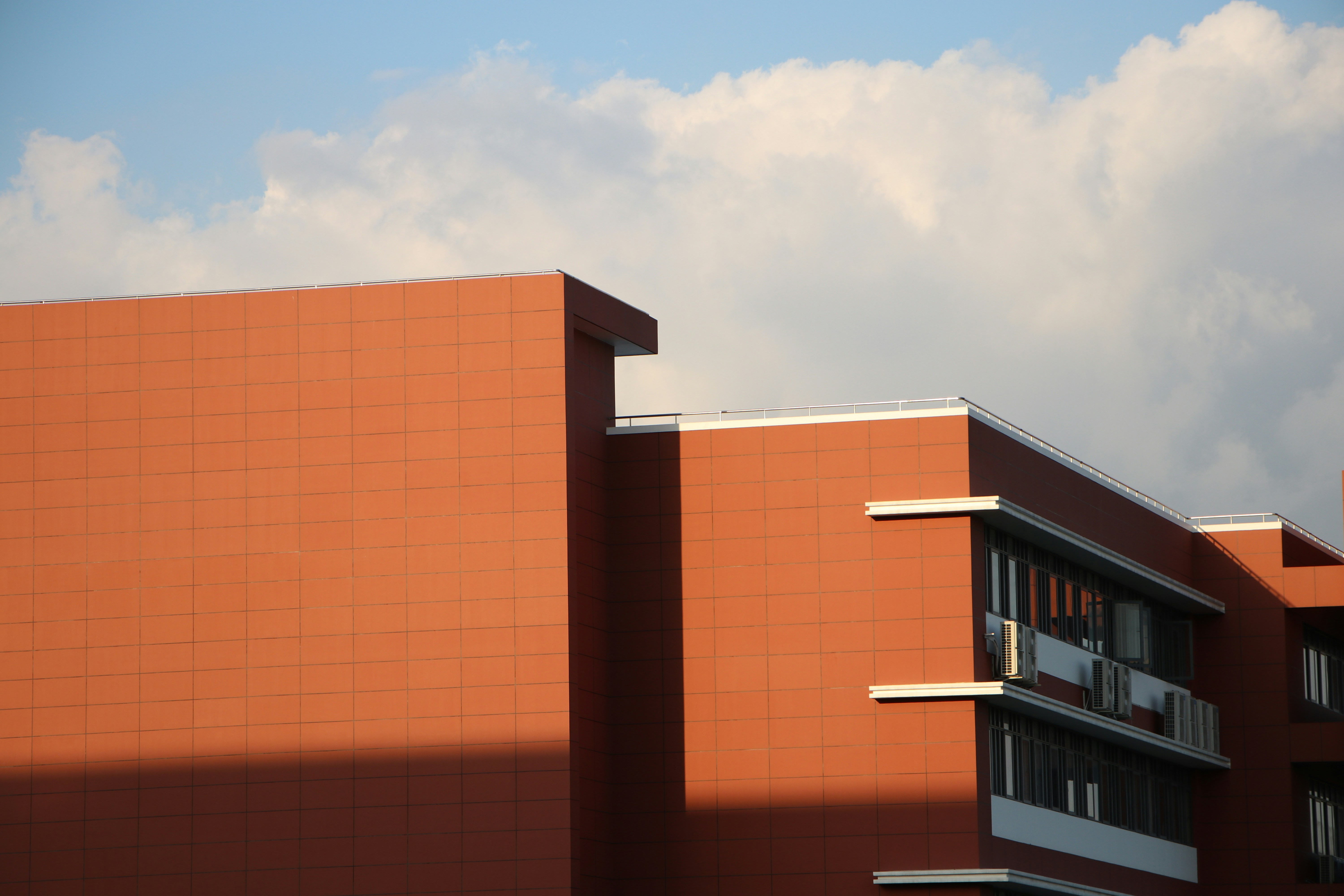 sunset building clouds