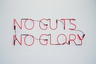red no guts no glory neon signage