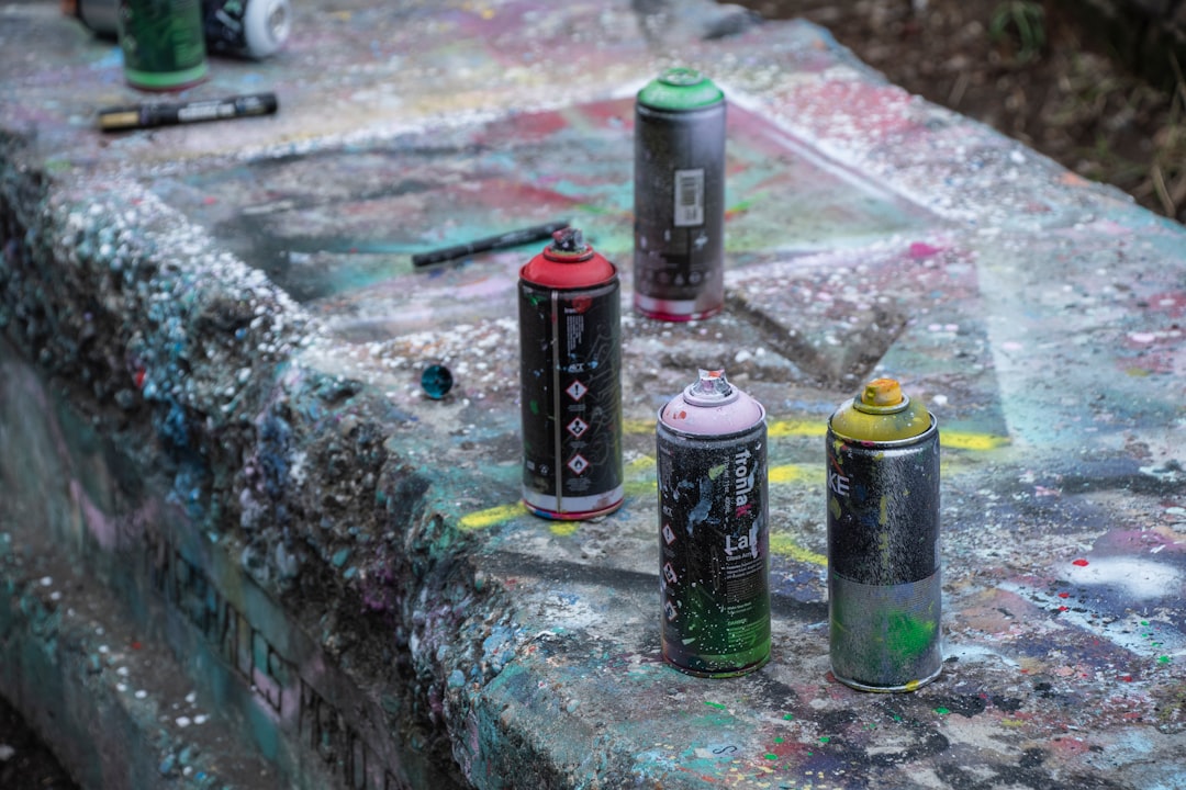 Spray cans at Nomadic Community Garden, London