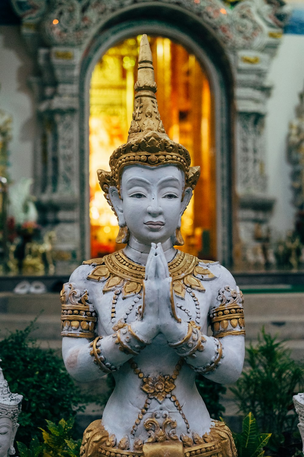 Buddha statue near building