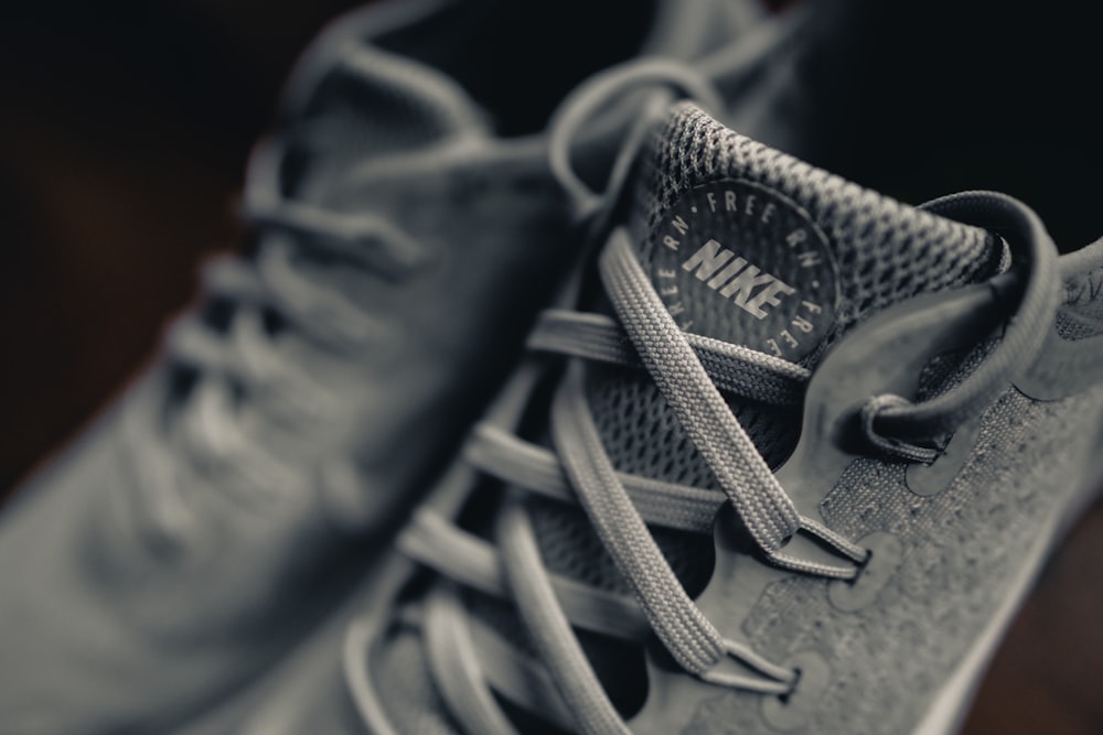 a black and white photo of a pair of sneakers