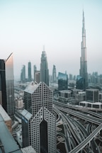 wide-angle photography of high-rise buildings and Burj Khalifa during daytime
