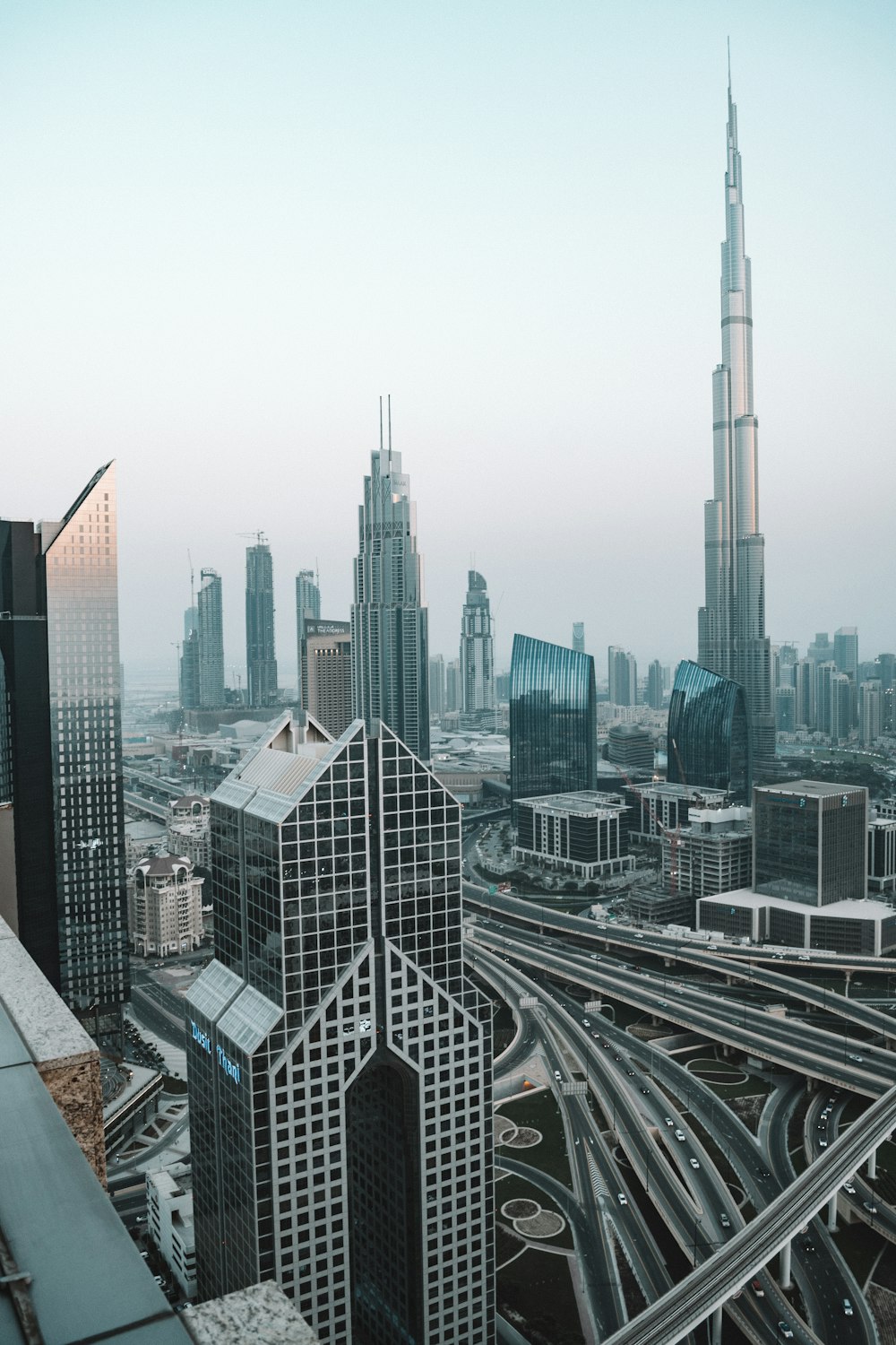 wide-angle photography of high-rise buildings and Burj Khalifa during daytime