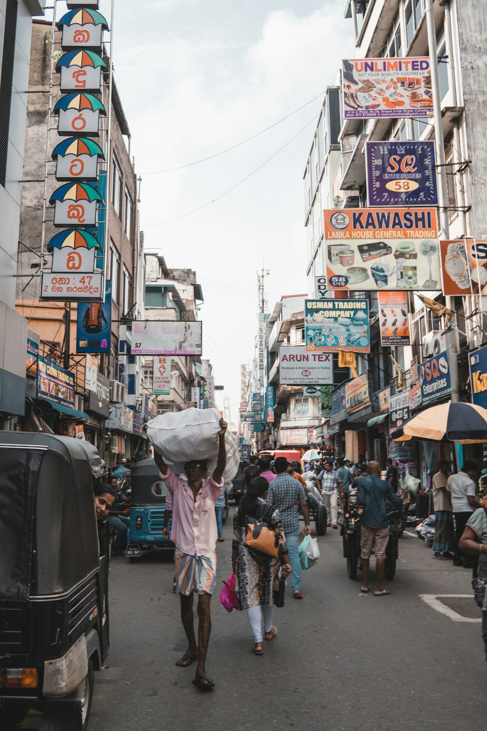 photography of people near street during daytime