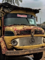 A commercial fleet truck receiving a quick lube service from a SpeedUp technician.