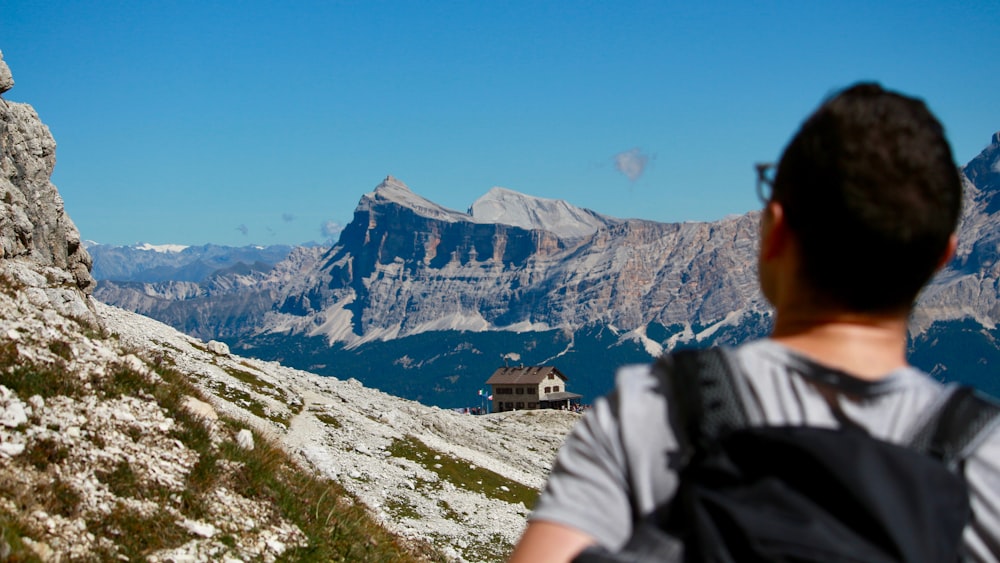 man wearing black backpack