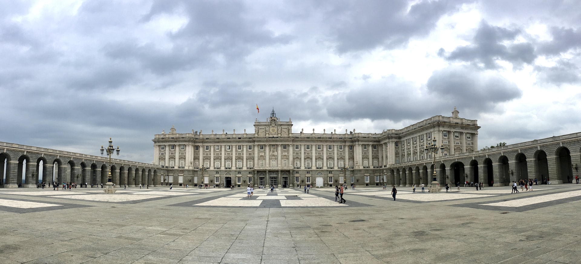 The Royal Palace of Madrid (Palacio Real) courtyard on a cloudy afternoon