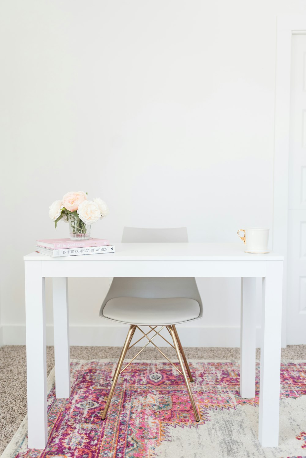 white table and chair minimalist photo