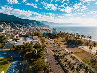 Local athletes training outdoors with the Cali skyline in the background.