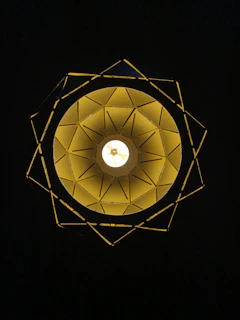 Close-up of the rotating star projector lamp showing its sleek design and glowing star projections.