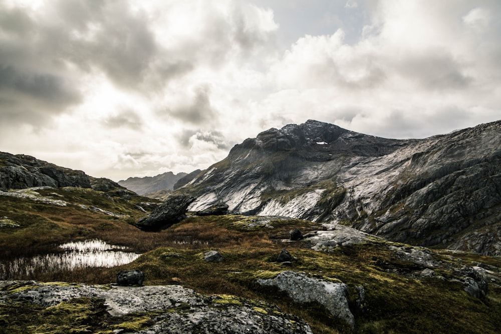 green mountain covered snow