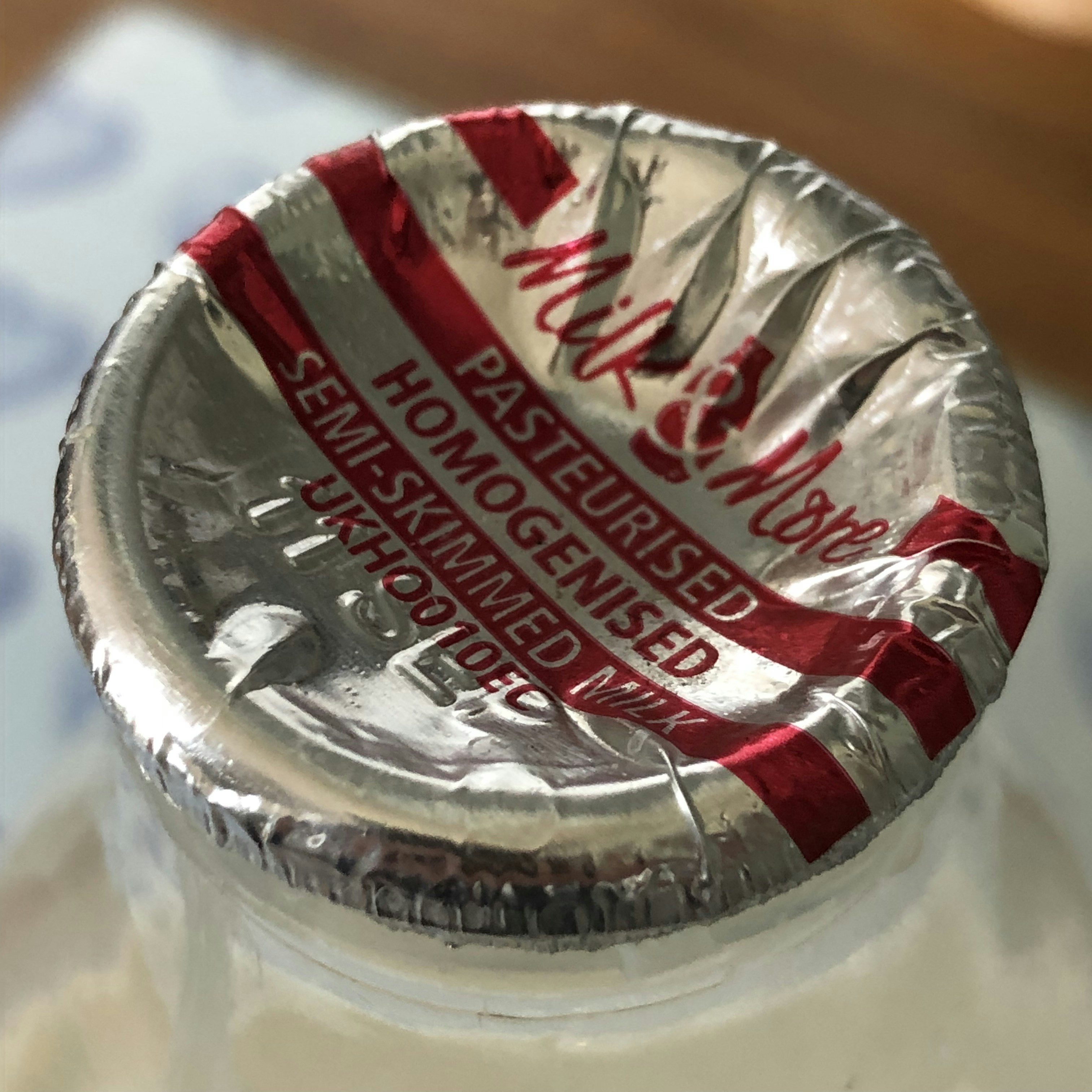 Download Green And Yellow Labeled Beer Bottle On Wooden Table Photo Free Alcohol Image On Unsplash Yellowimages Mockups