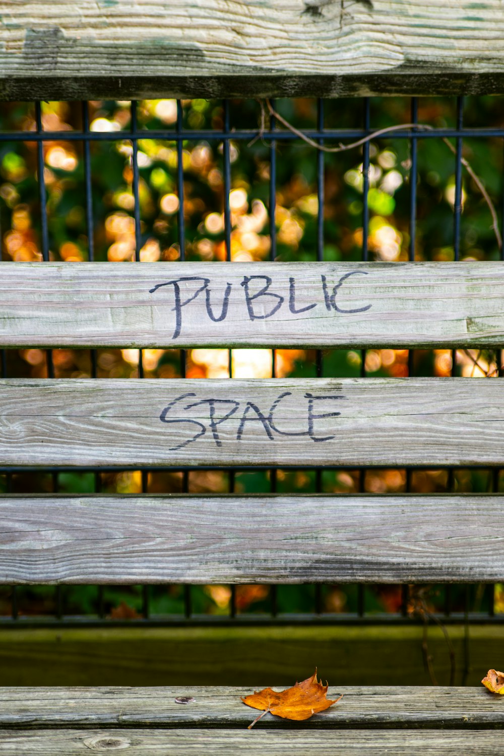 brown wooden frame with public space sign