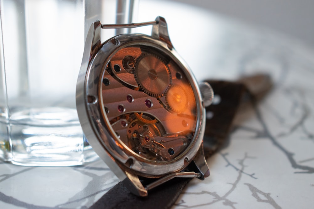 round brown skeleton watch