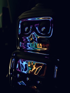 a black suitcase with neon lights on it