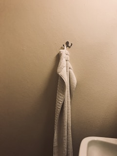 hung white towel